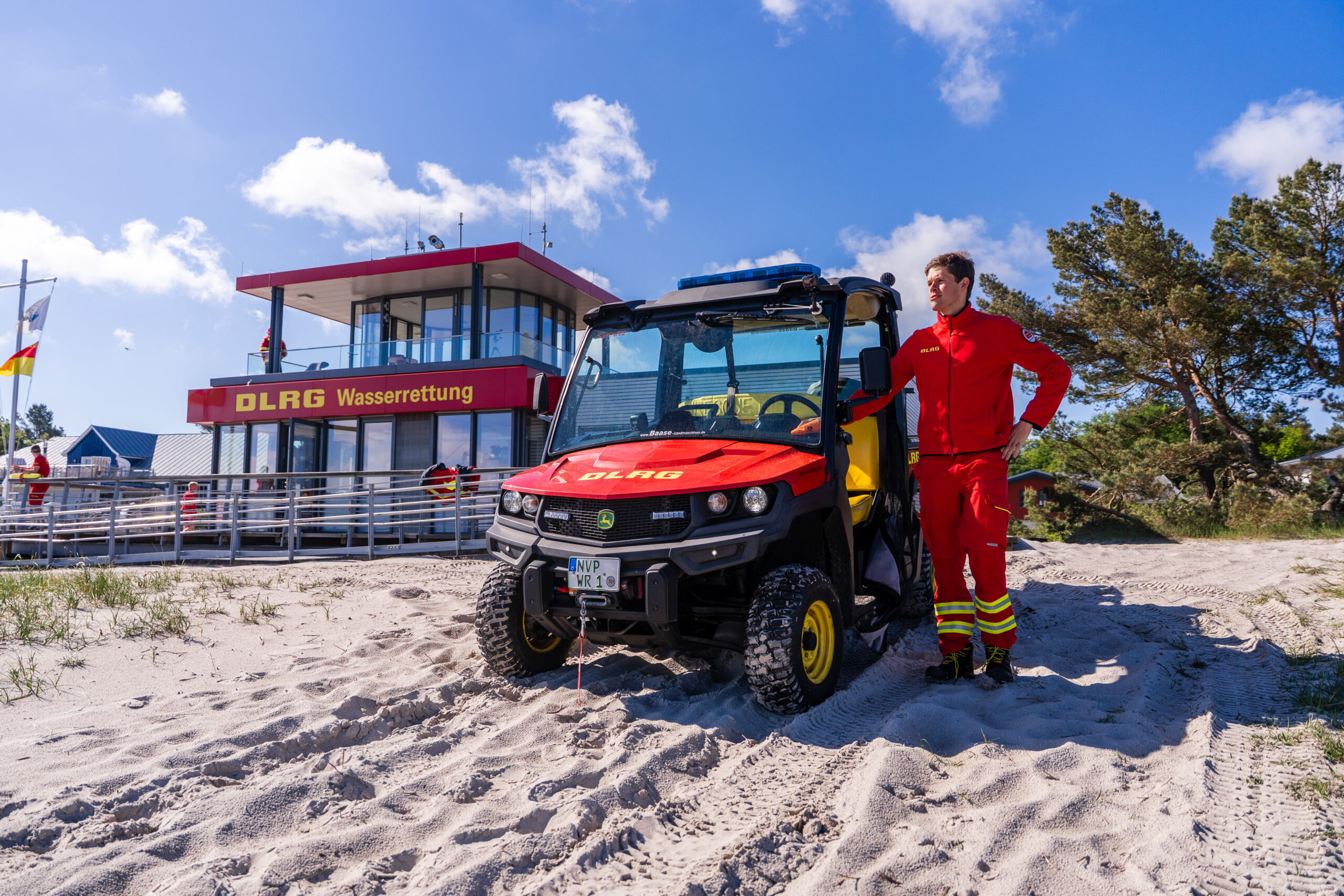 Between the dunes and the water rescue station, the all-terrain emergency response vehicle stands ready for the next deployment of the ZWRD-K.